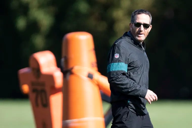Eagles general manager Howie Roseman walks onto the field during practice at the NovaCare Complex in South Philadelphia, Pa. on Thursday, October 28, 2021.