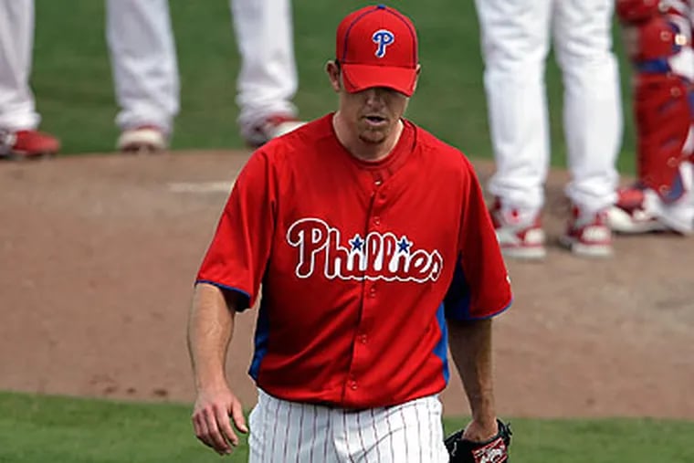 Brad Lidge's injured shoulder is a major concern for the Phillies as they return to Philadelphia. (David Maialetti/Staff Photographer)