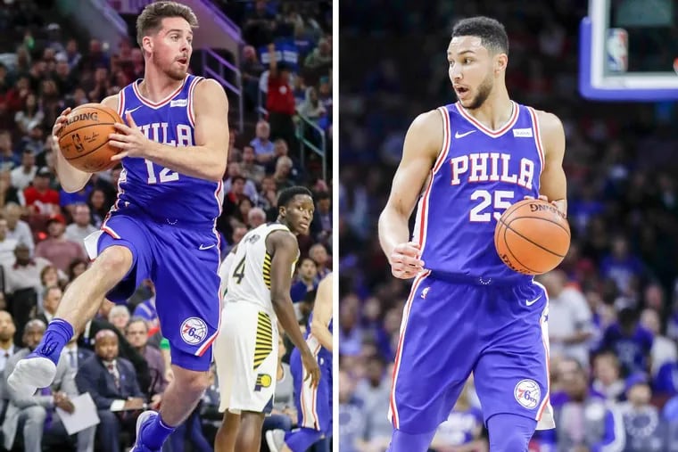 Sixers guards T.J. McConnell (left) and Ben Simmons  against the Indiana Pacers on Friday.