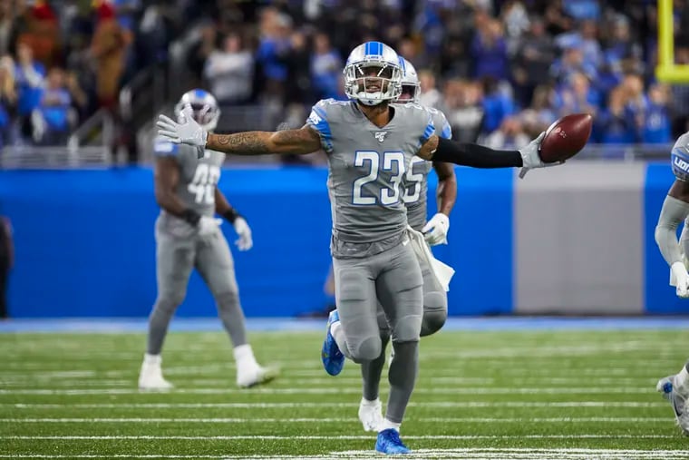 Detroit Lions cornerback Darius Slay, wearing No. 23, celebrates an interception against the Chicago Bears during an NFL football game in Detroit, Thursday, Nov. 28, 2019.