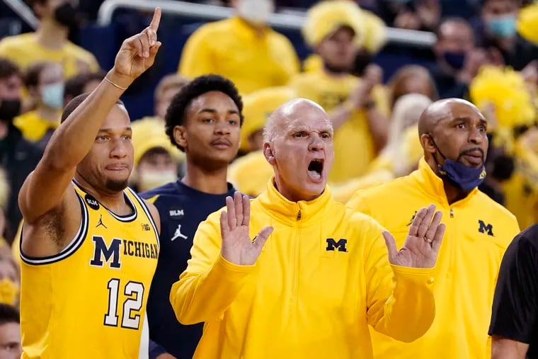 Michigan interim head coach Phil Martelli yells from the sideline during the first half against Michigan State.