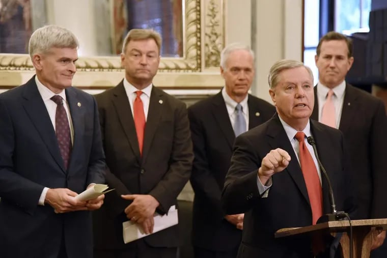 As  Sen. Lindsey Graham speaks about health-care reform at a news conference on Sept. 13, behind him are (from left)  Sens. Bill Cassidy, Dean Heller, and Ron Johnson, and former Sen. Rick Santorum.
