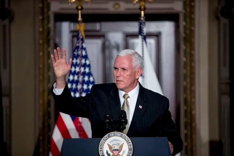 Vice President Mike Pence is expected in Philadelphia on Tuesday to raise money for the Republican Governors' Association alongside Scott Wagner, the GOP nominee for governor in Pennsylvania. Here, Pence waves after speaking at a reception in the Eisenhower Executive Office Building in Washington, on Monday.