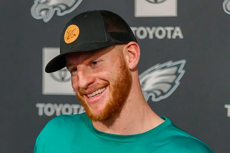 Eagles quarterback Carson Wentz was all smiles as he met with the media on the first day of OTAs.