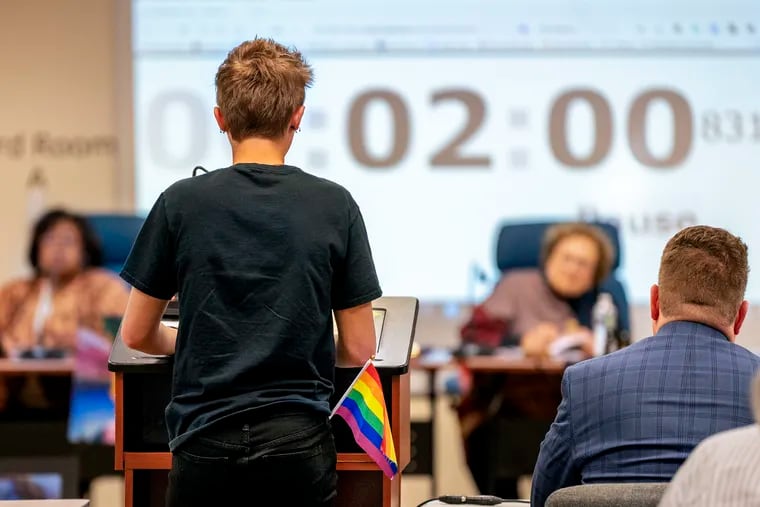 Student Wesley Hiester addresses the West Chester school board on March 28 in support of keeping the book Gender Queer in high school libraries. The board voted to retain the book, but other districts have reached different decisions on book challenges.