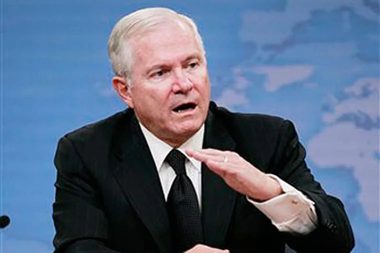 Secretary of Defense Robert Gates speaks at the Pentagon on Monday. Gates said that tough economic times require that he shutter a major command that employs some 5,000 people in Norfolk, Va., and begin to eliminate other jobs throughout the military. (AP Photo / Manuel Balce Ceneta)