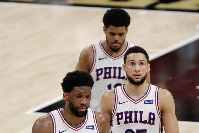 Sixers center Joel Embiid, guard Ben Simmons and forward Tobias Harris walk off the court late in the game against the Atlanta Hawks in Game 4 of the NBA Eastern Conference playoff semifinals, in which the Sixers blew an 18-point lead, ahead of blowing a 26-point lead in Game 5 Wednesday.