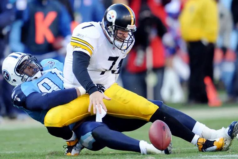 Steelers quarterback Ben Roethlisberger fumbles the ball as he is sacked by backup Titans defensive lineman Jason Jones.