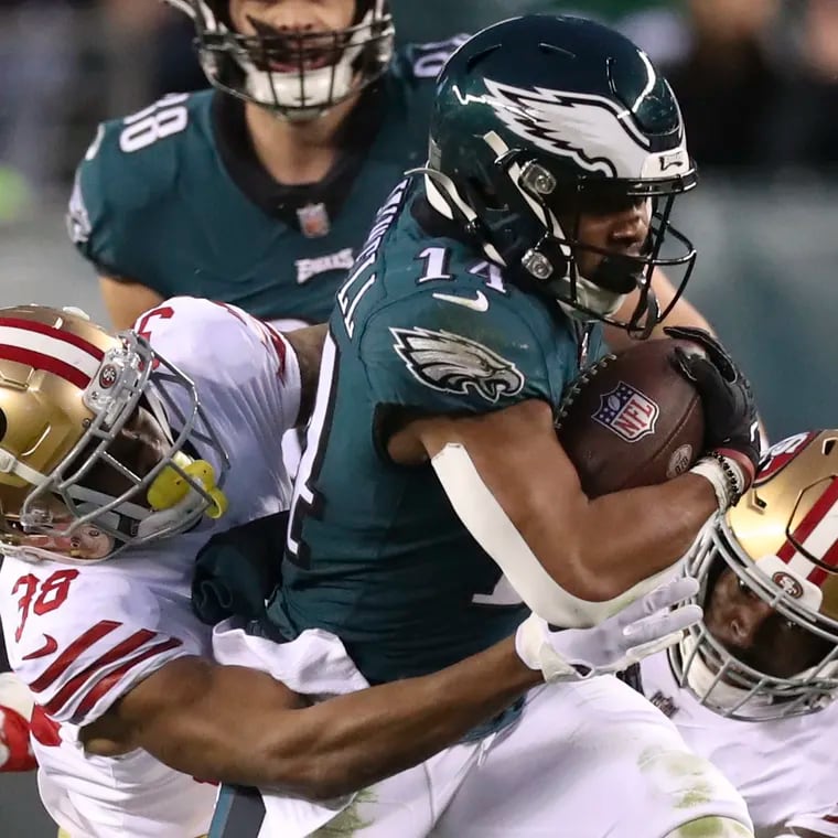 Eagles running back Kenneth Gainwell fights for yardage in the third quarter against the 49ers.