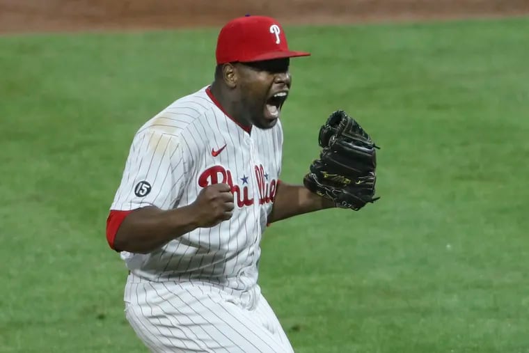 Phillies closer Hector Neris celebrates after closing out a win over the Milwaukee Brewers earlier this season.