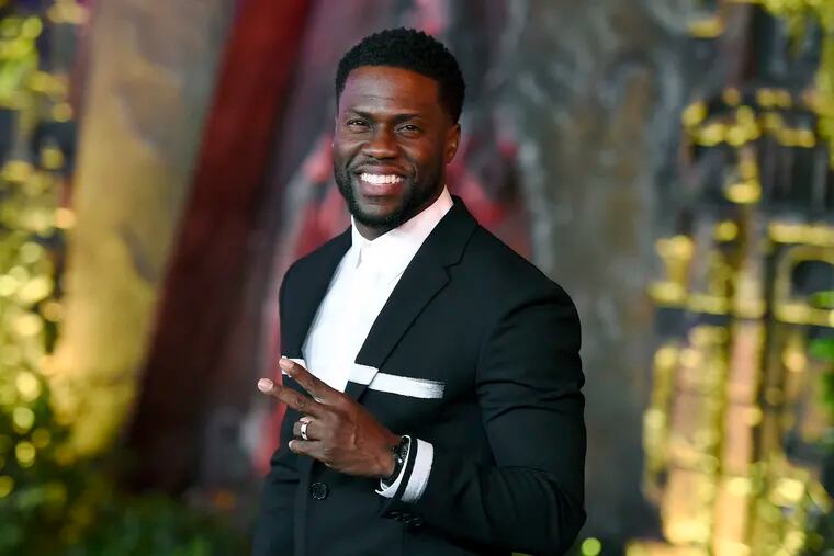 FILE - In this Dec. 11, 2017 file photo, Kevin Hart arrives at the Los Angeles premiere of "Jumanji: Welcome to the Jungle" in Los Angeles. Hart will host the 2019 Academy Awards, fulfilling a lifelong dream for the actor-comedian. Hart announced Tuesday, Dec. 4, 2018, his selection in an Instagram statement and the Academy of Motion Picture Arts and Sciences followed up with a tweet that welcomed him "to the family."