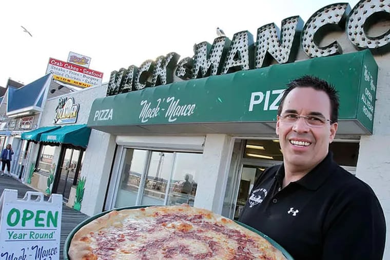 In May 2011, Manco & Manco's Chuck Bangle posed in front of what was then known as Mack & Manco.