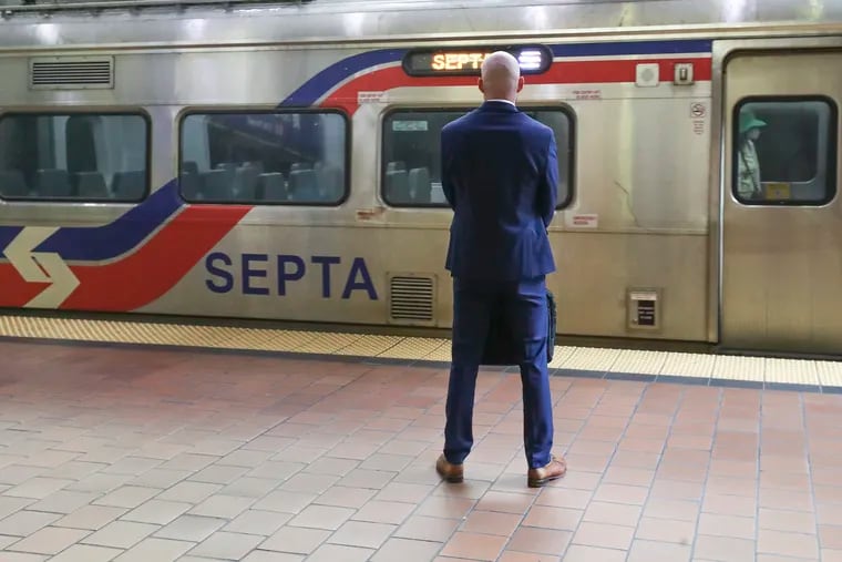 A commuter waits for their regional rail train at Jefferson Station in Philadelphia on Wednesday, May 31, 2023. As more workers return to Center City, some commuters complain that SEPTA's less-frequent schedules make it harder to get to the office.