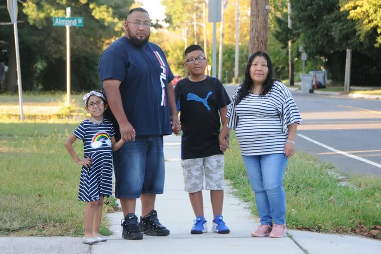 The U.S. government told Maria Perez, right, and her partner, Josue Hernandez, second from left, to get out of the country, with or without their children. Jonayra, 8, pictured left, is being treated cancer. Their son, Josue Hernandez, is third from left. The family lives in Vineland, N.J.
