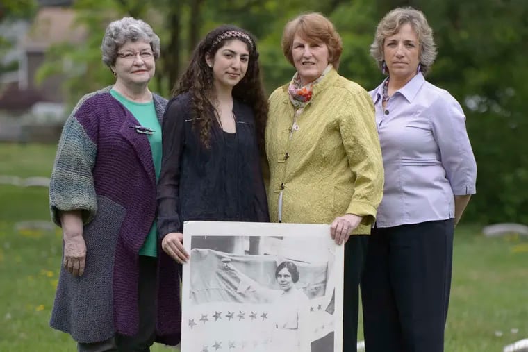 In Cinnaminson , (from left) Jean Perry, Margaux Vellucci, Barbara Irvine, and Lucienne Beard gather at the Westfield Friends site where Alice Paul is buried. TRACIE VAN AUKEN