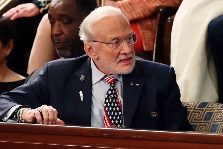 FILE - In this Feb. 5, 2019, file photo, astronaut Buzz Aldrin attends President Donald Trump's State of the Union address on Capitol Hill in Washington. A legal fight between Aldrin and his adult children over whether the former astronaut was competent to manage his affairs ended Wednesday, March 13, averting a messy, intrafamily squabble from hanging over celebrations this summer of the 50th anniversary of his Apollo 11 moon-walking.
