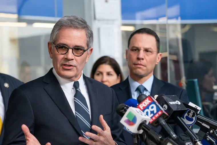 Philadelphia District Attorney Larry Krasner has filed suit against the office of Attorney General Josh Shapiro following the announcement of a proposed multistate settlement with Johnson & Johnson and three major opioid distributors. Here, Krasner and Shapiro are seen together in a 2019 press conference.