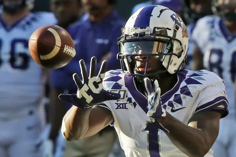 TCU wide receiver Jalen Reagor (1) reaches for a pass in the second half of an NCAA college football game against Oklahoma State in Stillwater, Okla., last season.