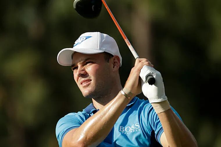 Martin Kaymer, of Germany, watches his tee shot on the 18th hole during the first round of the U.S. Open golf tournament in Pinehurst, N.C., Thursday, June 12, 2014. (Charlie Riedel/AP)