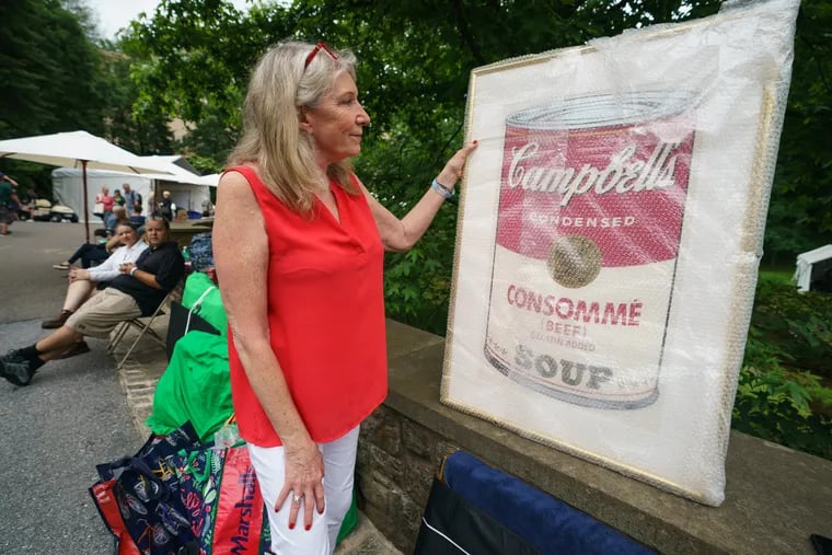 Liz from Philadelphia looks at her Campbell's Soup print by Andy Warhol at Winterthur Museum & Gardens in Delaware.