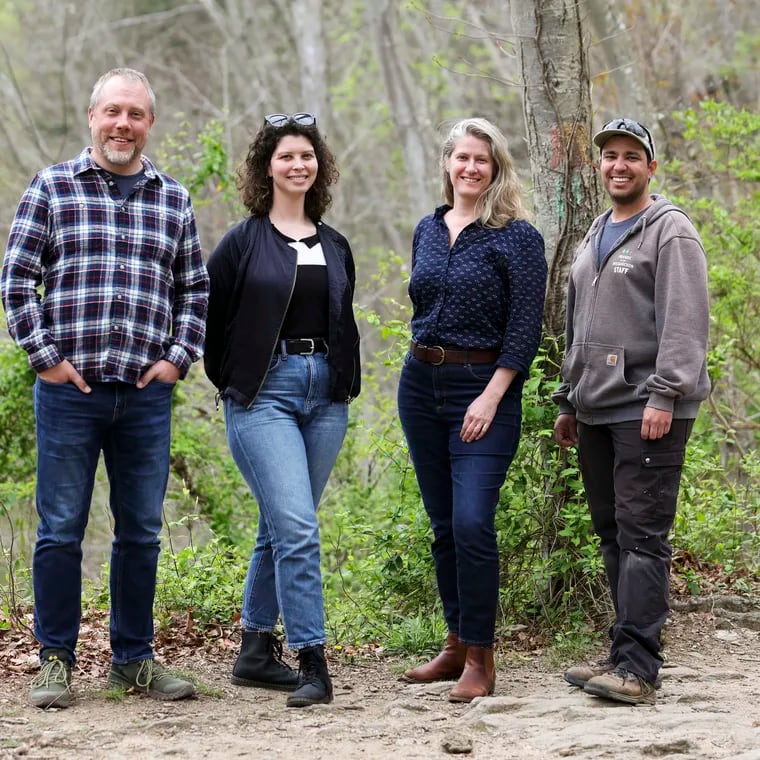 (From left) Friends of the Wissahickon staffers Shawn Green, director of field stewardship; Pauline Berkowitz, project manager; Ruffian Tittmann, executive director; and Varian Bosch, field manager, at Wissahickon Valley Park.