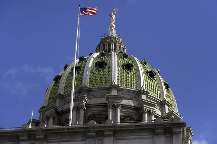 The American flag flies at the Pennsylvania State Capitol building in Harrisburg.