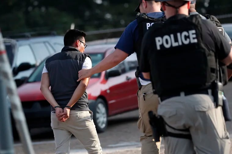 This person was among detainees that U.S. immigration officials picked up when they raided several Mississippi food processing plants, including this Koch Foods Inc., plant in Morton, Miss., Wednesday, Aug. 7, 2019. The early morning raids were part of a large-scale operation targeting owners as well as undocumented employees.
