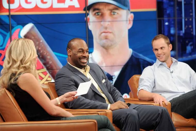 Chatting it up on the sofa are Charissa Thompson, Donovan McNabb, and Andy Roddick on &quot;Fox Sports Live.&quot; Critical reaction to the Fox Sports 1 channel has been mixed. (RAY MICKSHAW / Fox Sports 1)