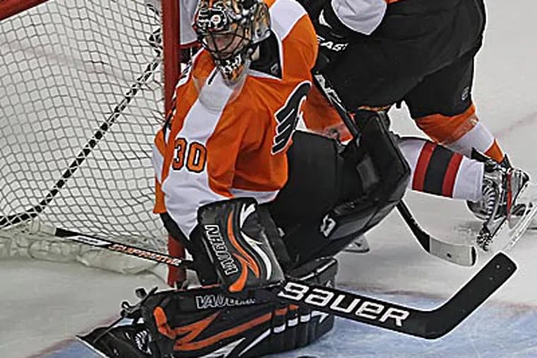 Ilya Bryzgalov stopped 31 of 34 shots in the Flyers' Game 2 loss to the Devils. (Michael Bryant/Staff Photographer)