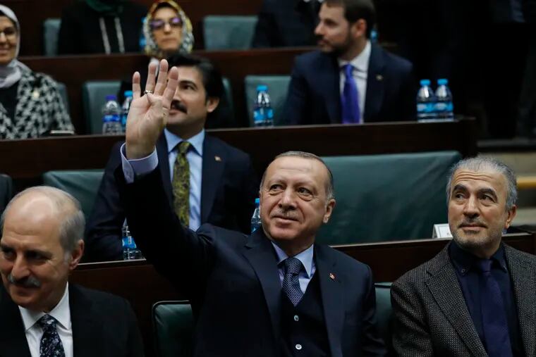 Turkey's President Recep Tayyip Erdogan at the parliament in Ankara, Turkey, on Tuesday.