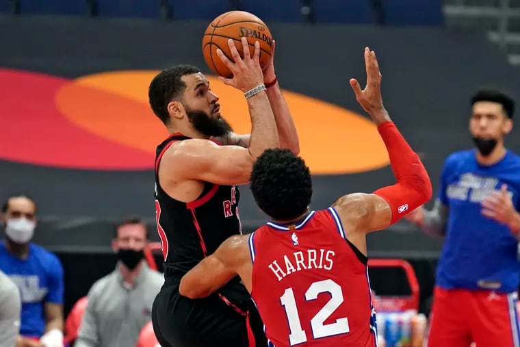Toronto Raptors guard Fred VanVleet (23) shoots over 76ers forward Tobias Harris during the second half.