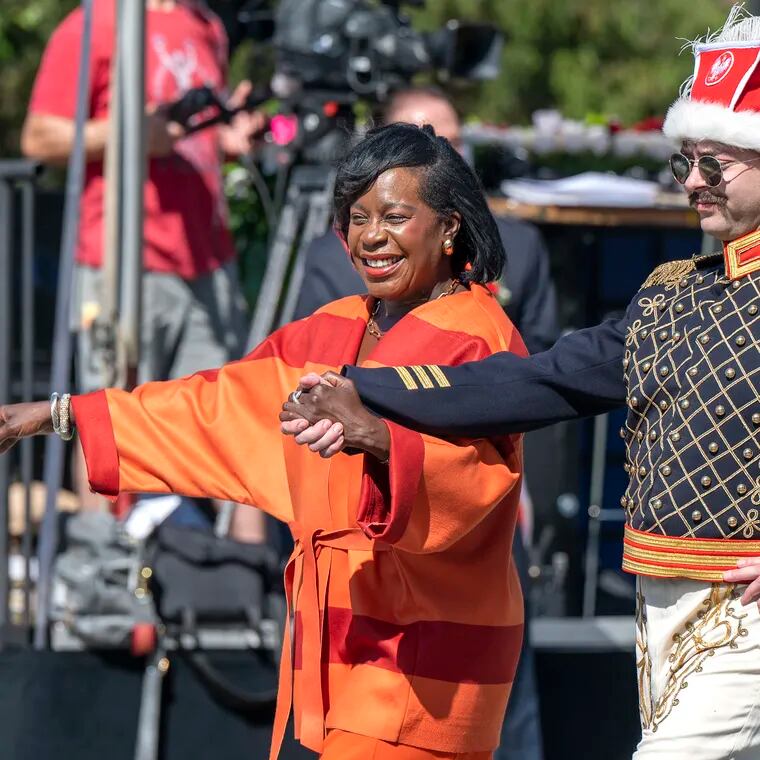 Democratic candidate for mayor Cherelle Parker dances with Andrew Klimek of York, Pa. portraying General Casimir Pulaski, in the Polonez, a traditional celebratory folk dance, at the finale the 90th Annual Pulaski Day Parade, on the Ben Franklin Parkway Sunday, Oct. 1, 2023. 