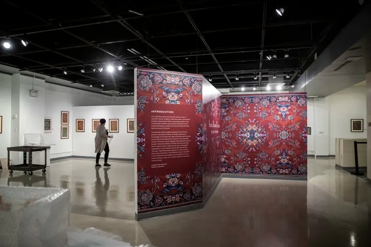 Dejáy B. Duckett, director of curatorial services, walks through the "Anna Russell Jones: The Art of Design" exhibit at the African American Museum. The exhibit is on display from May 6 to Sept. 12.