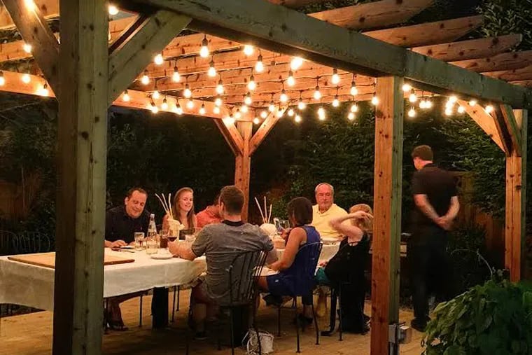 Diners at the pergola of Le Virtù in East Passyunk, which has considered outside dining an imperfect "lifeline" during the coronavirus pandemic.