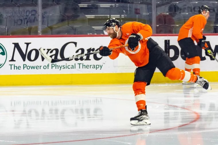 Claude Giroux shoots the puck during an optional morning skate ahead of the Philadelphia Flyers game against the Vegas Golden Knights on Tuesday, Mar. 8, 2022.