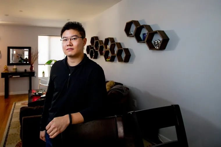 Ruokai Chen, shown here in his Kensington home, in Philadelphia, Wednesday, February 28, 2018. Chen has a tax abatement, in 2016 he received notice that that city was raising the assessment on his taxable land. Chen fought back and won in the Court of Common Pleas.