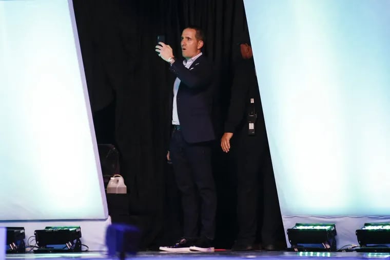 Eagles executive vice president of football operations Howie Roseman recording Super Bowl media night on Monday.