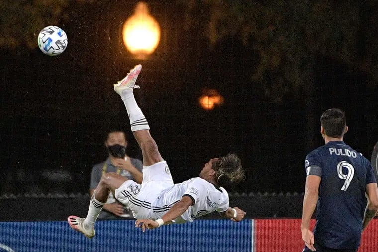 Union midfielder José Andrés Martínez made a bicycle-kick clearance after Alan Pulido's free kick hit the post early in the second half against Sporting Kansas City.