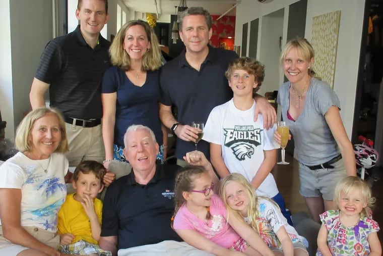 Dr. Heitzmann (center front) loved to spend time with his family.