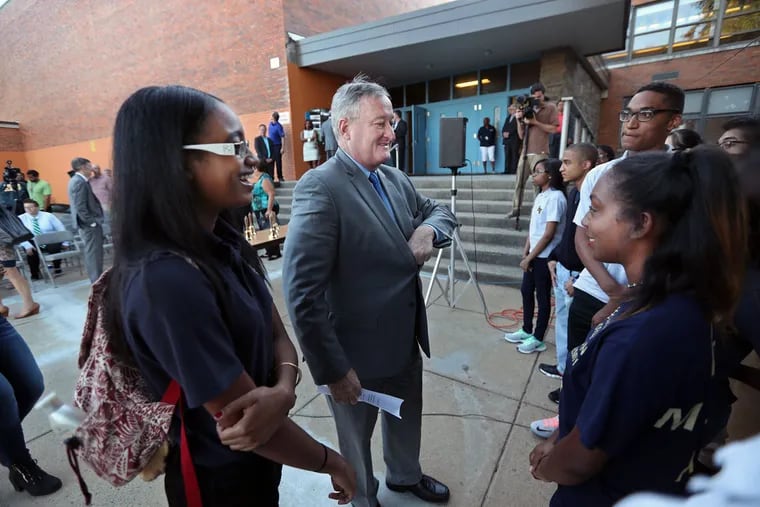 Mayor Kenney talks with seniors at Hill-Freedman World Academy on the first day of school.