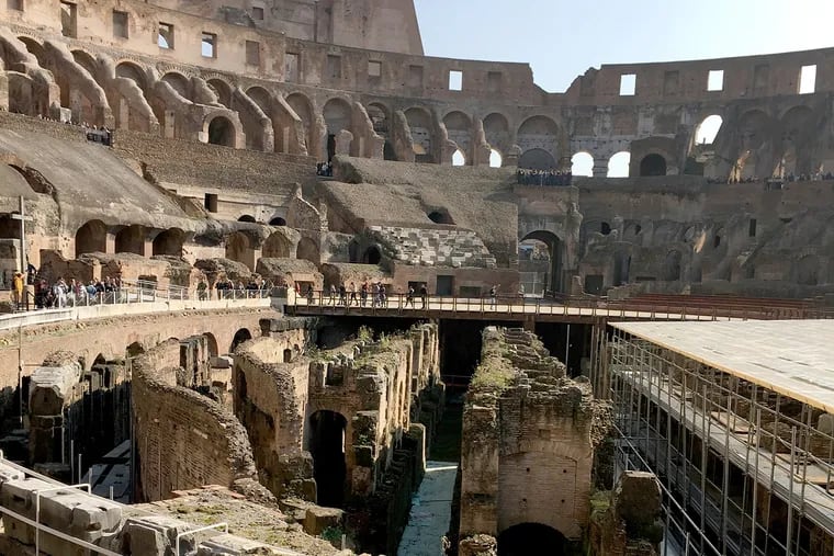 A view of the Colosseum in Rome, showing the tunnels and rooms that once housed animals and gladiators under the arena floor.