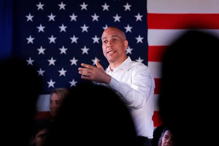 U.S. Sen. Cory Booker (D., N.J.), seen here at a campaign stop in Portsmouth, N.H. on Feb. 16, reintroduced a sweeping bill Thursday to legalize marijuana nationwide and expunge the records of people convicted of marijuana-related offenses.