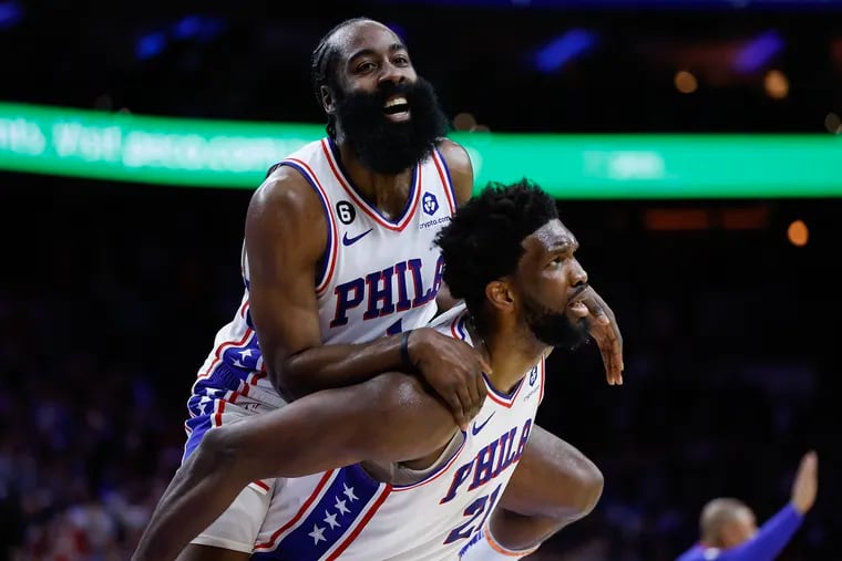 James Harden leaps on Joel Embiid after the big man hit a three-pointer against the Nuggets on Jan 28. That game may have iced the MVP for Embiid over Nuggets star Nikola Jokić.