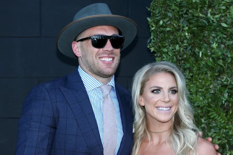 Zach Ertz and his wife, Julie, pose for photos while entering the Eagles' Super Bowl championship ring ceremony at 2300 Arena in South Philadelphia on Thursday, June 14, 2018. Players received their Super Bowl rings at the private ceremony.