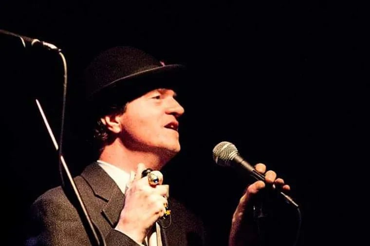 David W. Wannop is a concert promoter based in Center City. In this 2013 photo, he's acting as emcee at an arts event.