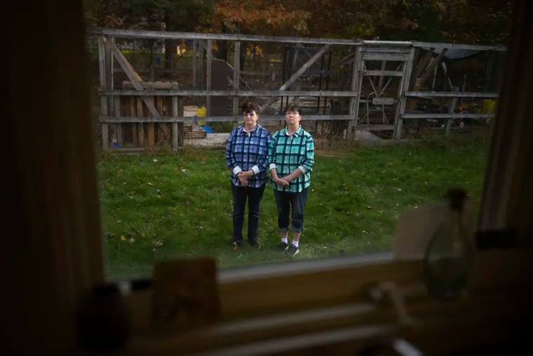 Twins Lori Leonard (left) and Debra Leonard at Lori’s home in Scotia, Pa.