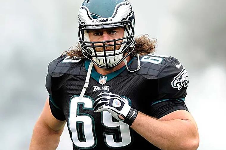 Eagles guard Evan Mathis recently underwent surgery to "clean out" his left ankle and could miss the rest of spring practices, an NFL source said. (Michael Perez/AP)