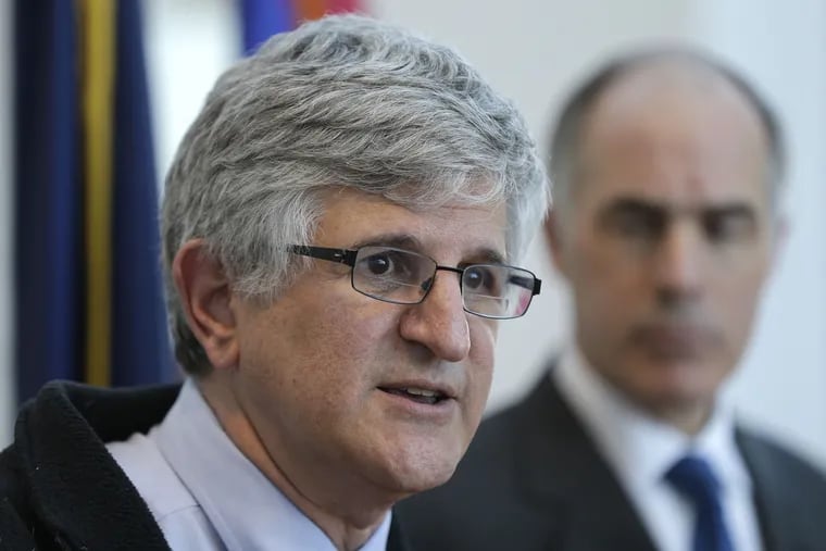 U.S. Sen. Bob Casey, right, looks on as Dr. Paul Offit, the Director of the Vaccine Education Center at at The Children's Hospital of Philadelphia, speaks during a news conference in 2015 in Philadelphia where steps were outlined to  curb a measles outbreak.