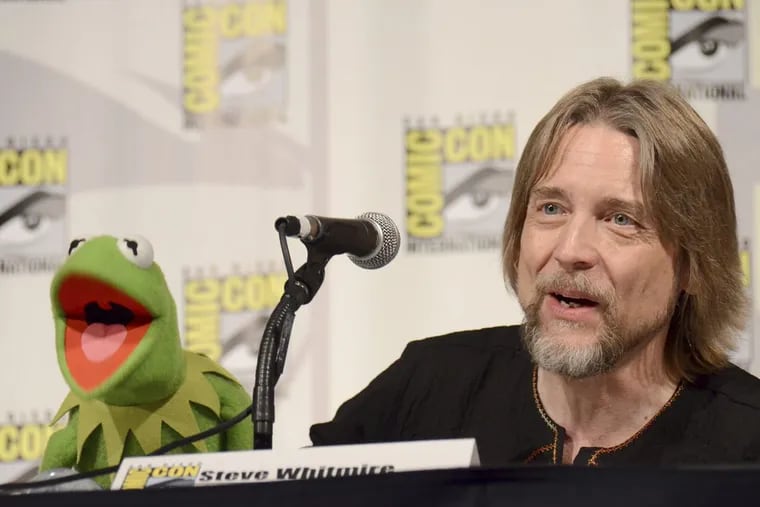 Steve Whitmire, seen here beside Kermit the Frog at the 2015 San Diego Comic-Con, as provided the voice for the iconic puppet for 27 years. Now, he’s been fired.