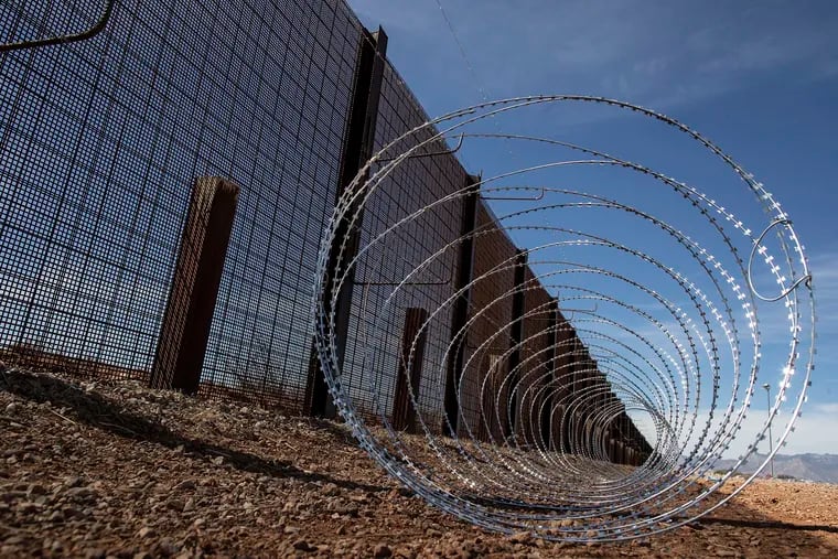This image shows the concertina wire that was installed earlier this year by U.S. Army troops on the border barrier in Cochise County, Ariz. The Trump administration is pushing for a big border wall as the number of immigrants in the U.S. reaches a record number.